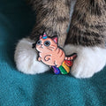 Cat unicorn enamel pin with rainbow trail