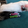 Hello World code tag enamel pin — programmer gift