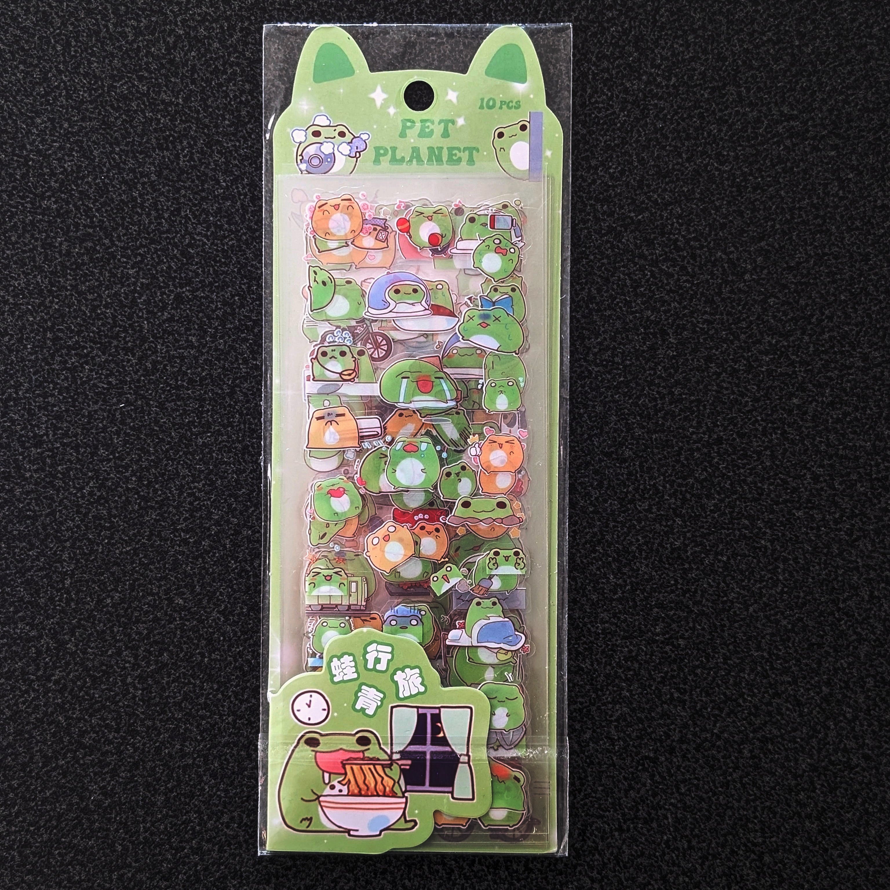 Colorful waterproof frog stickers designs, including one eating sushi and another looking at a window.